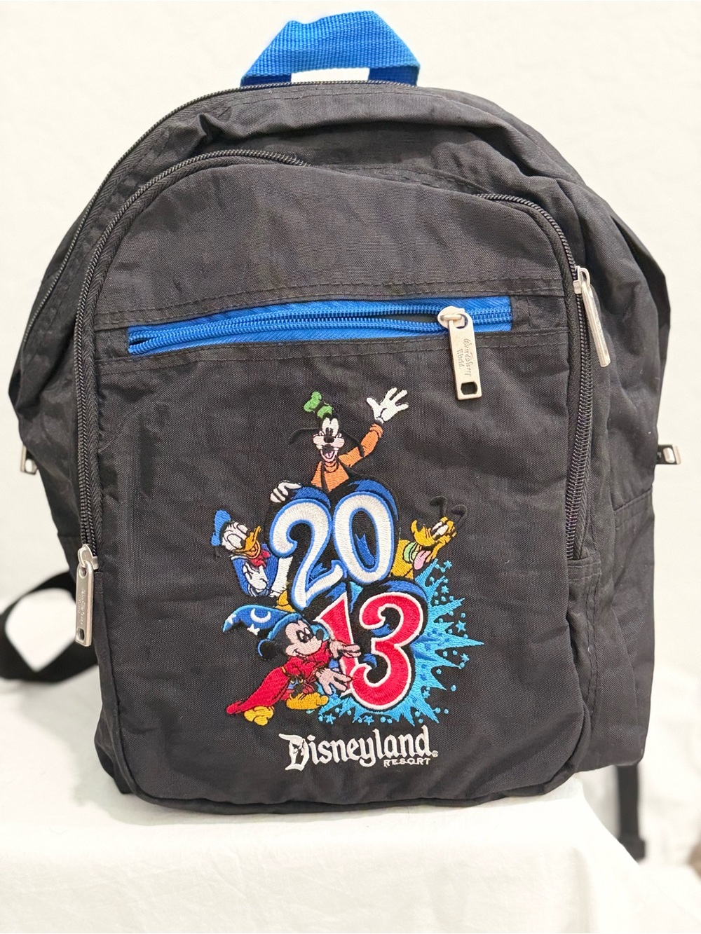 Disney Black Backpack with Blue Accents and Embroidered 2013 Characters